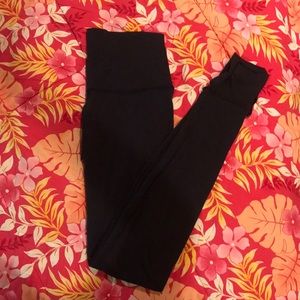 Black Lululemon leggings with stirrups